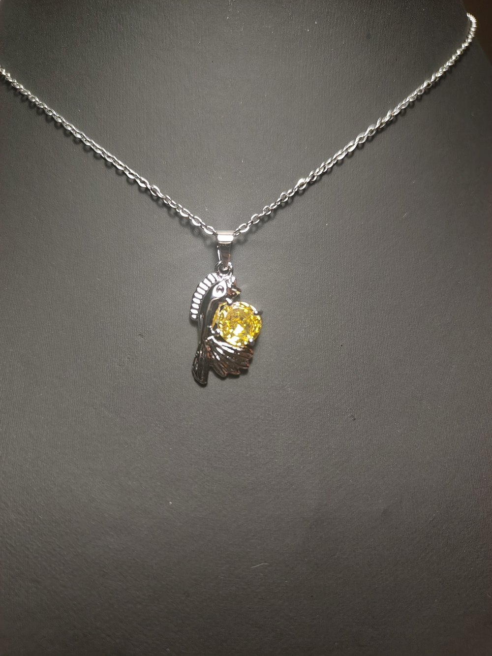 Silver Parrot Pendant Necklace with Yellow Gem